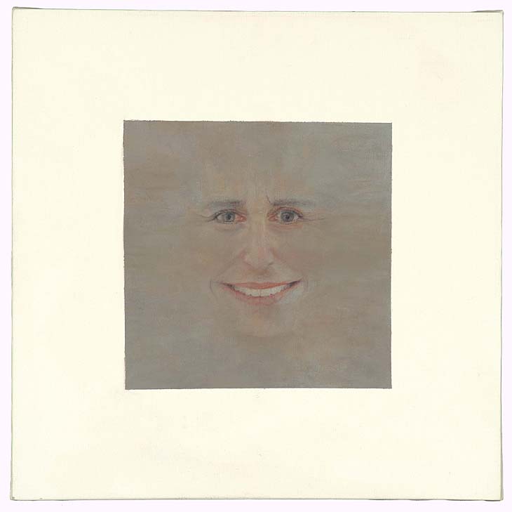 Smiling face emerging from empty grey square in the center of white expanse.