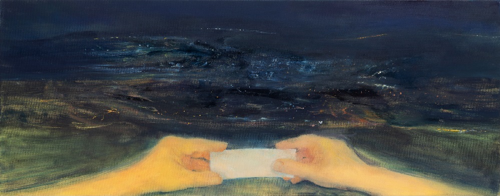 Two hands holding an empty piece of paper, against a brightly lit nighttime landscape.